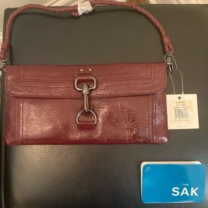 New with Tags The Sak Glendora Oxblood Patent Leather Crossbody Bag
